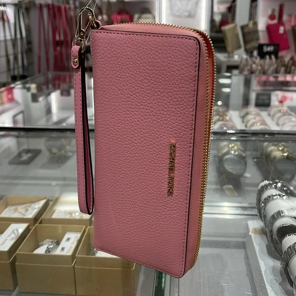 MICHAEL KORS JST 
Leather Continental Wristlet Phone Case Wallet 
Carnation 
NWT - Picture 11 of 16